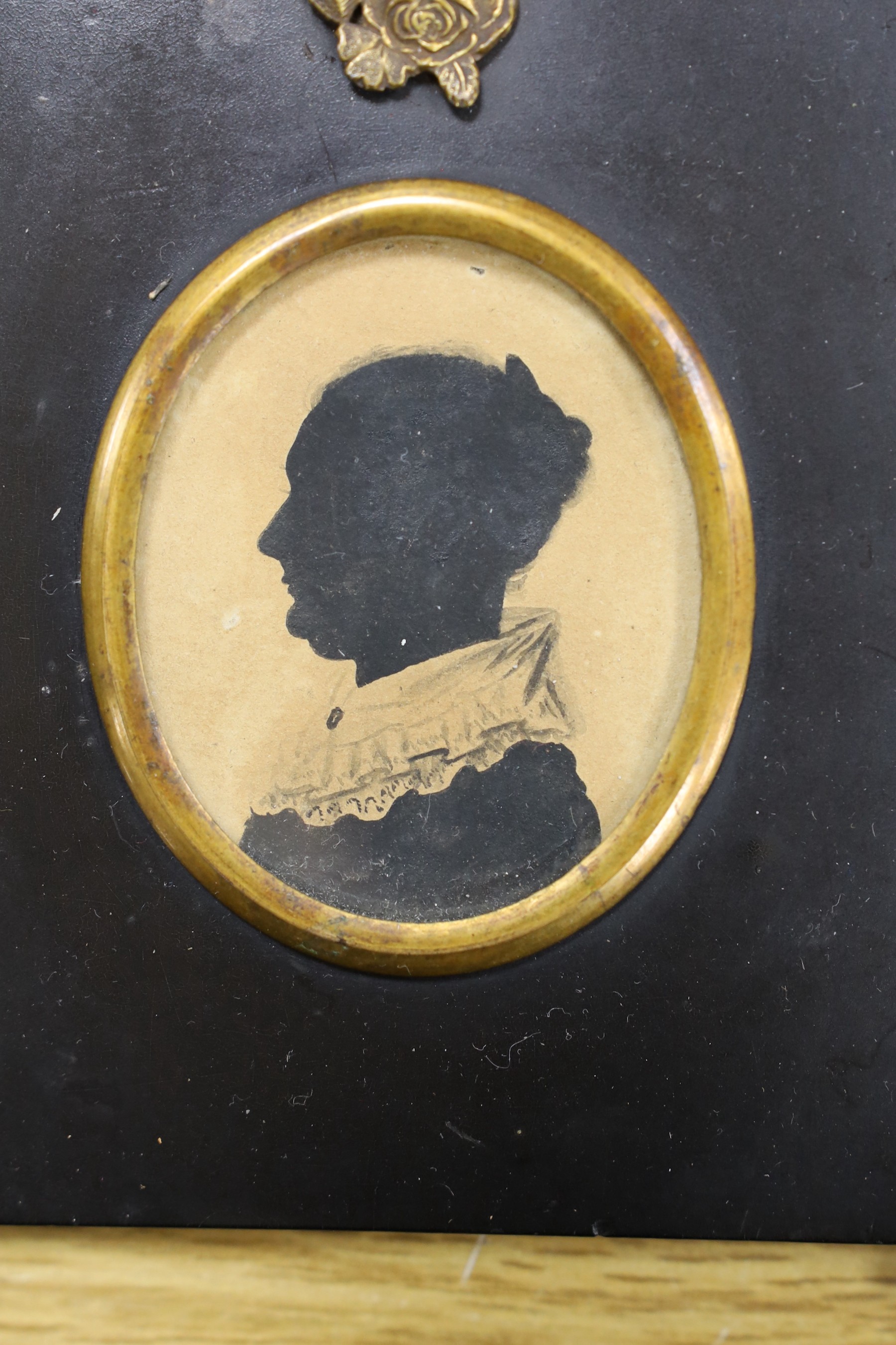Four Victorian painted and cut paper silhouettes of Colonel John Campbell and other members of his family